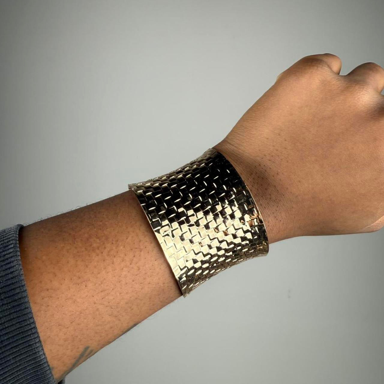 Gold tone bangle cuff