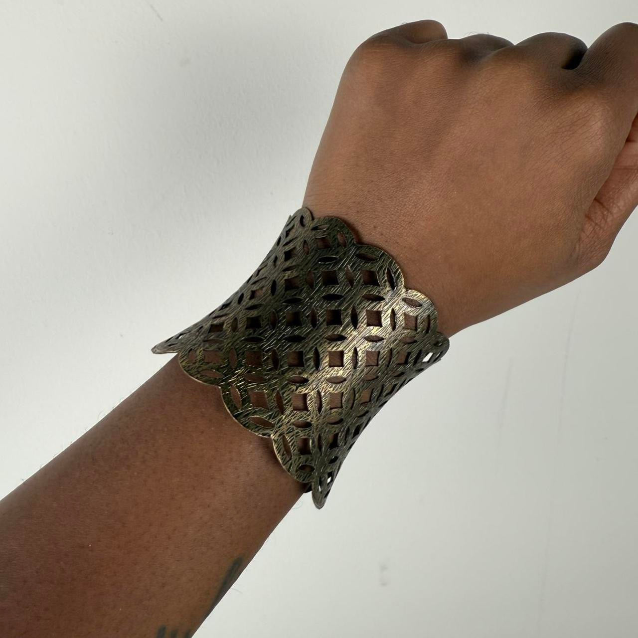 Gold tone bangle cuff