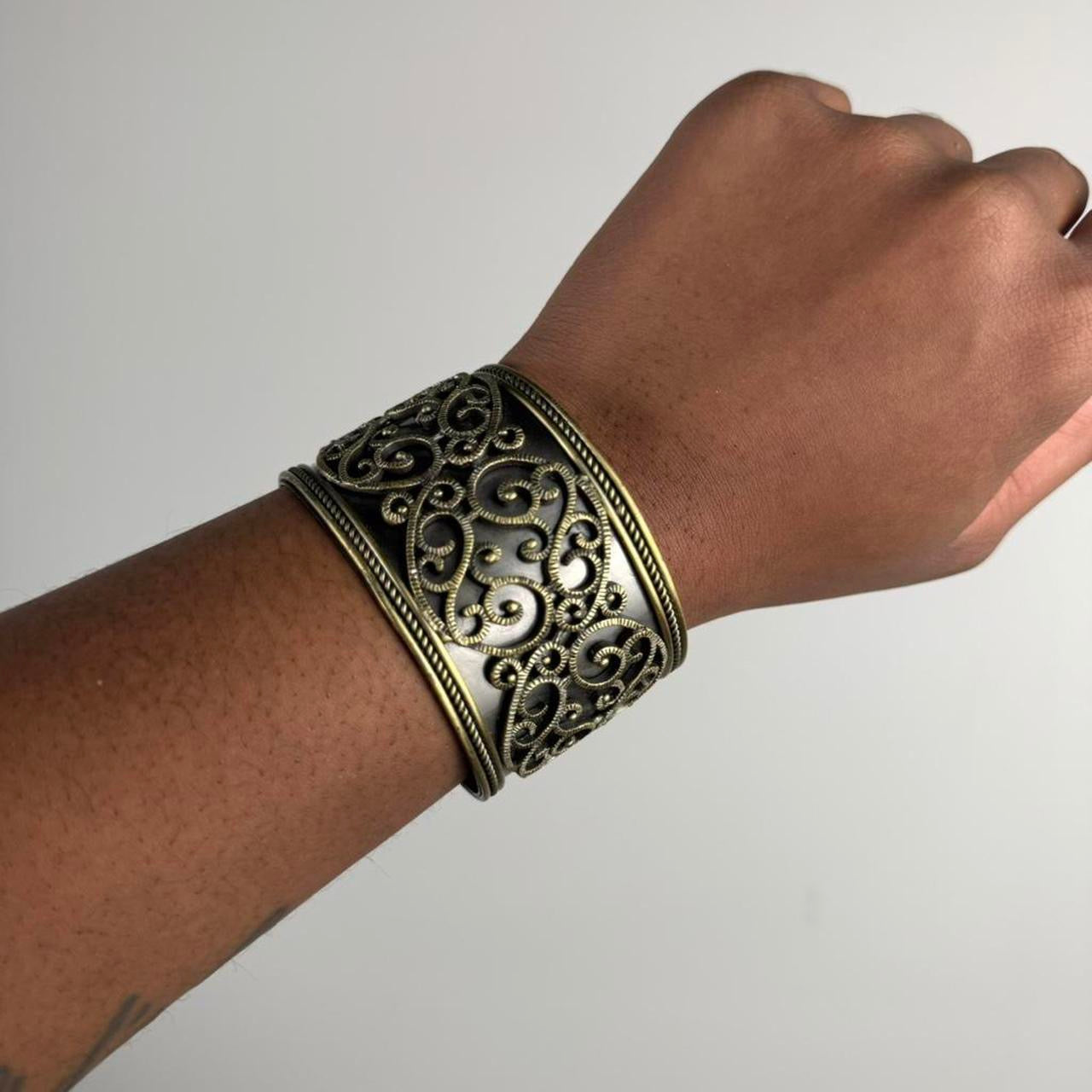 Gold tone bangle cuff