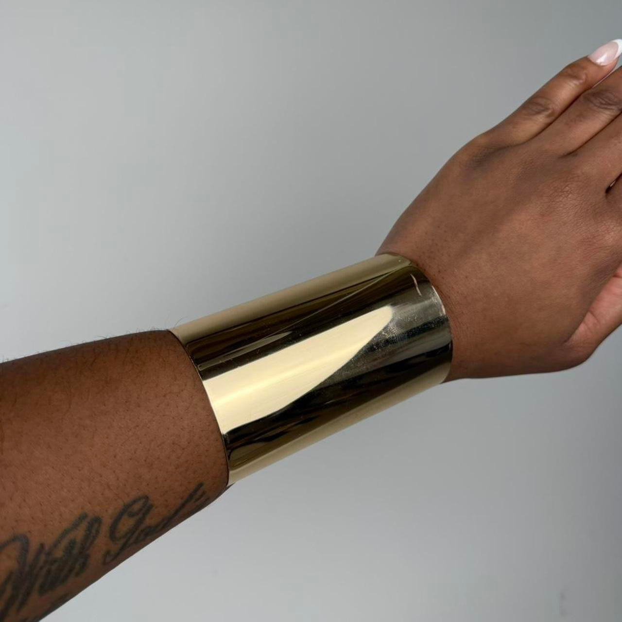Gold tone bangle cuff