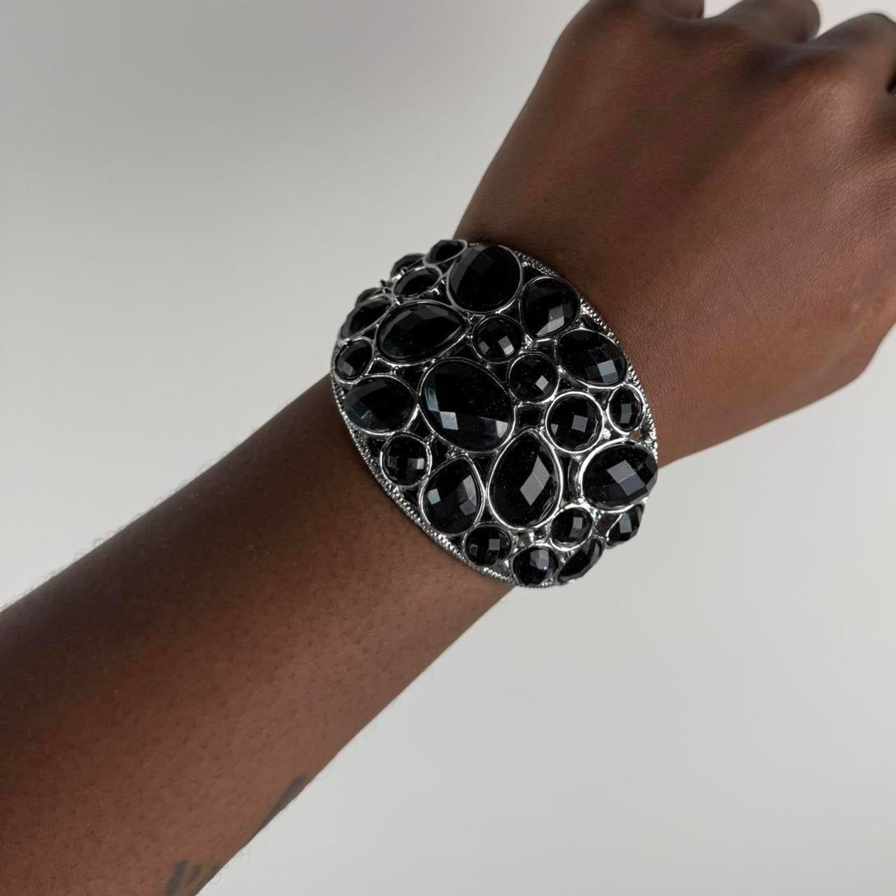 Silver tone studded bangle cuff