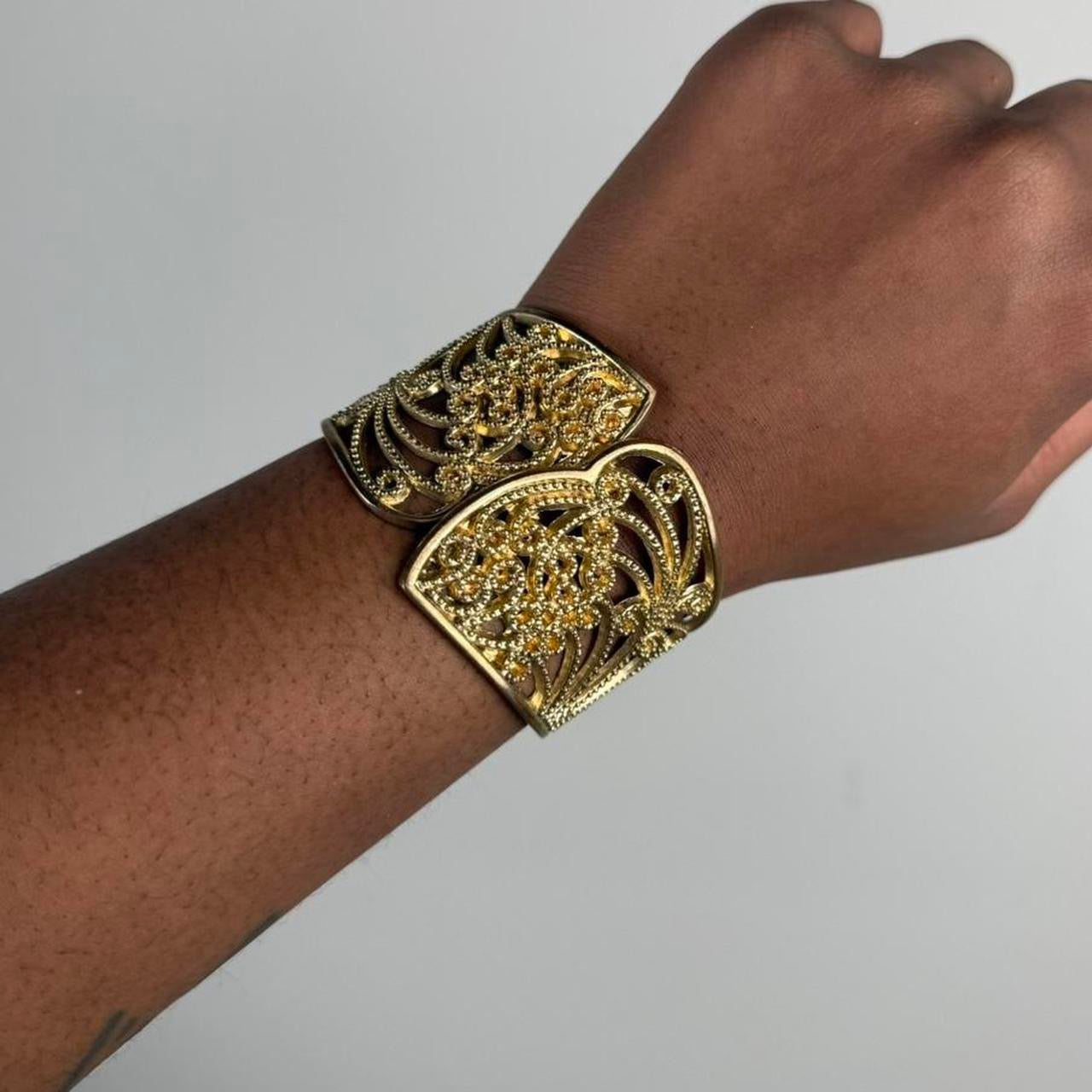 Gold tone bangle cuff