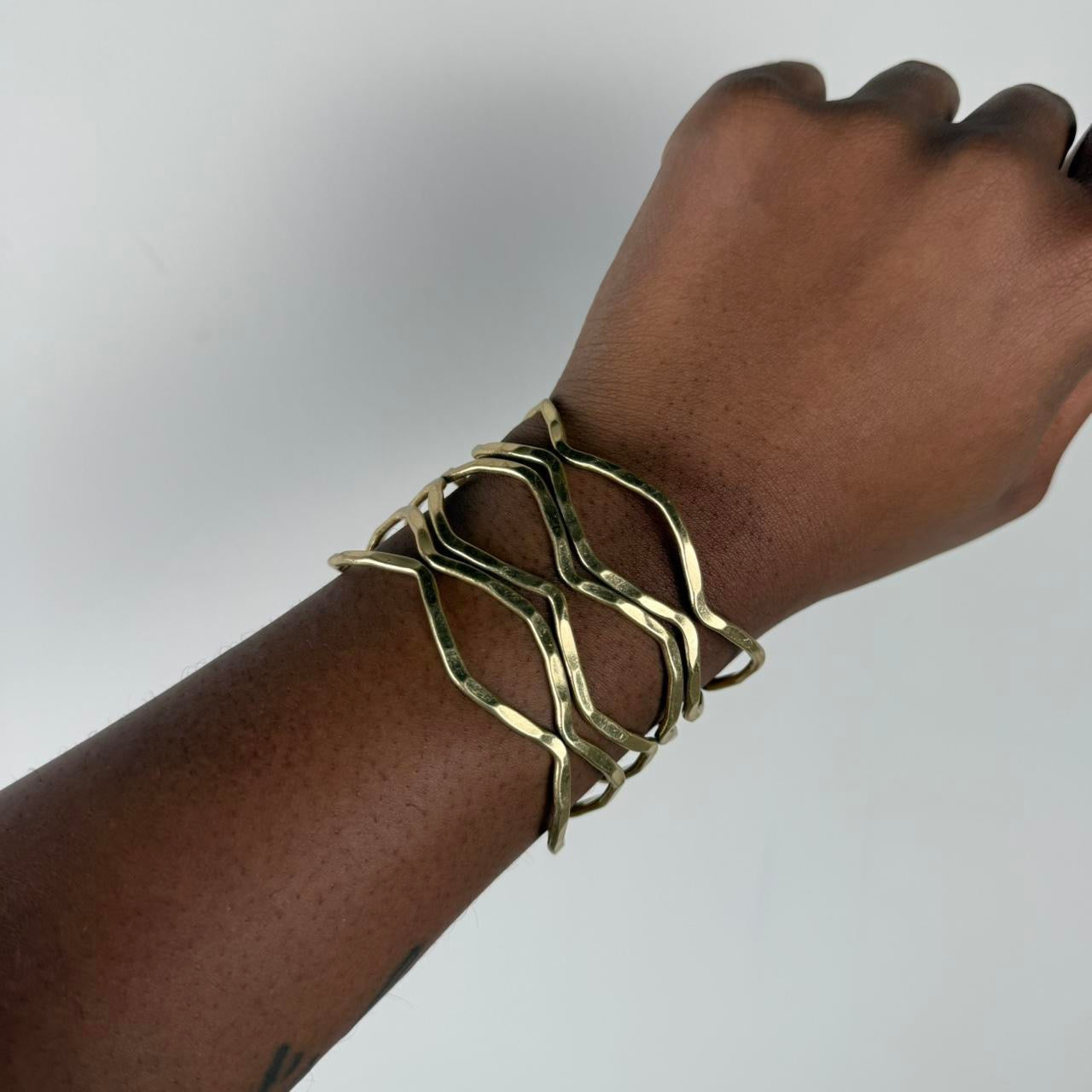 Gold tone bangle cuff