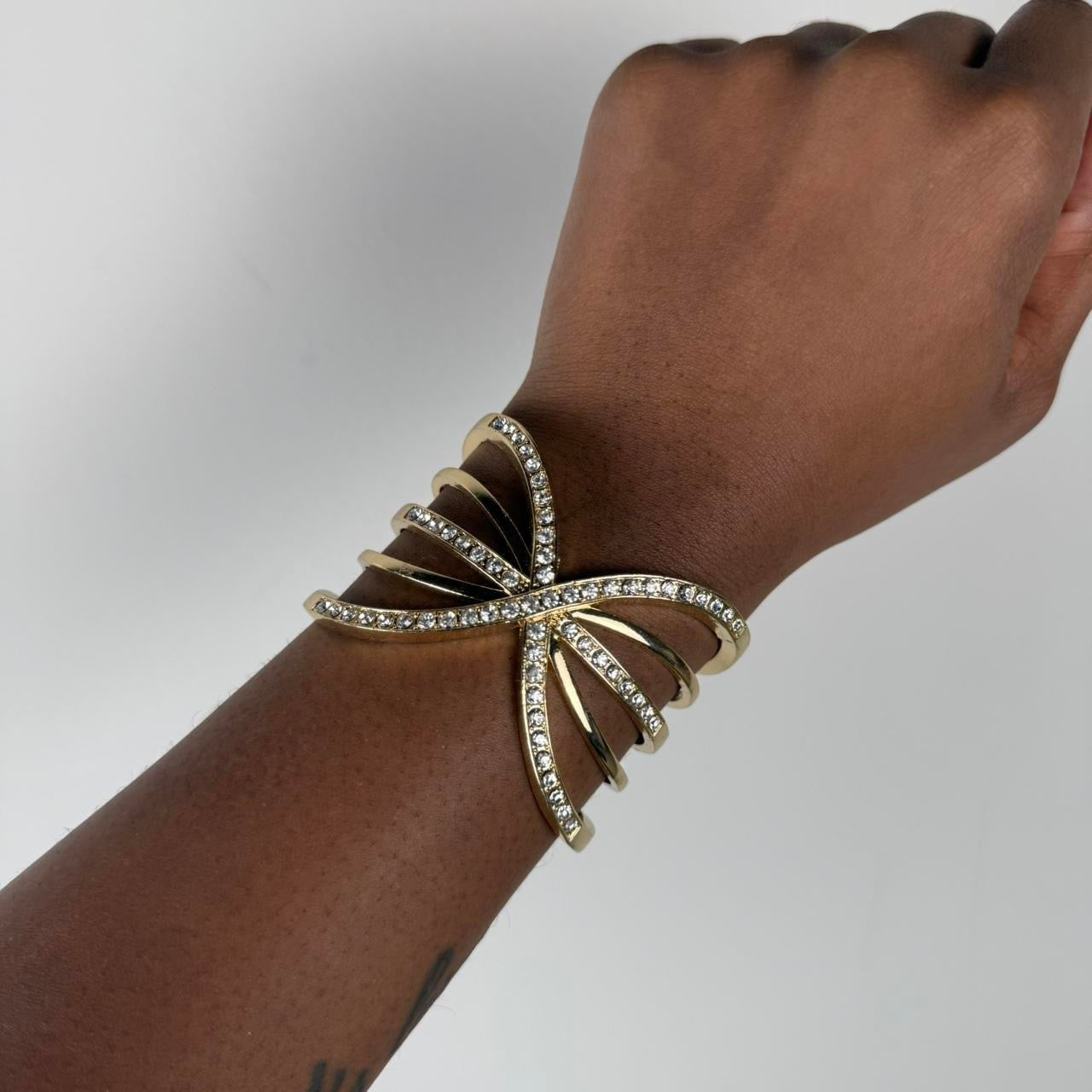 Gold tone bangle cuff