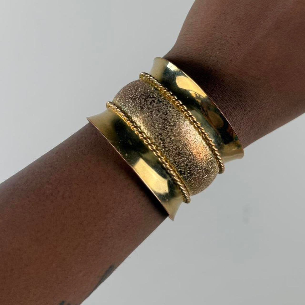 Gold tone bangle cuff