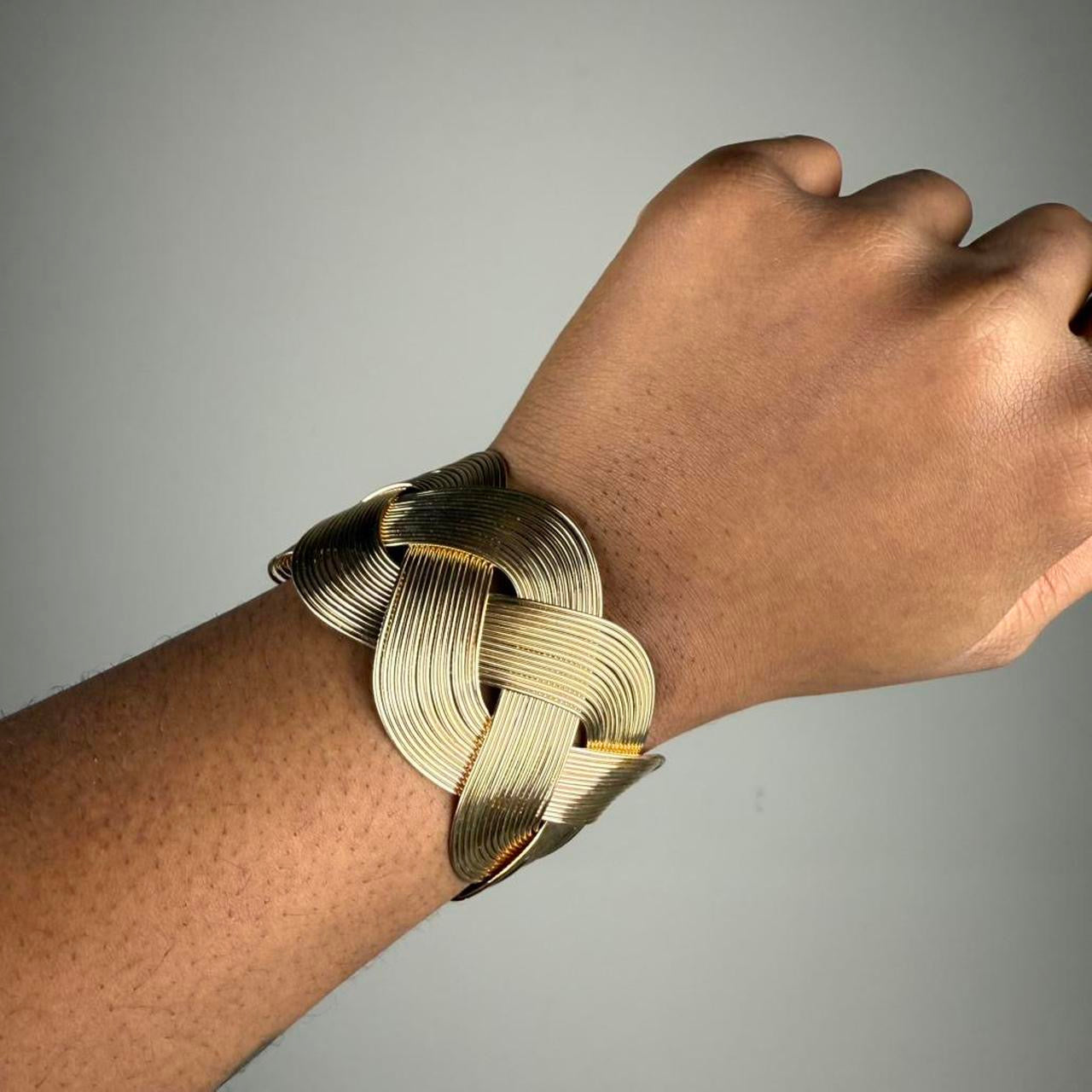 Gold tone bangle cuff