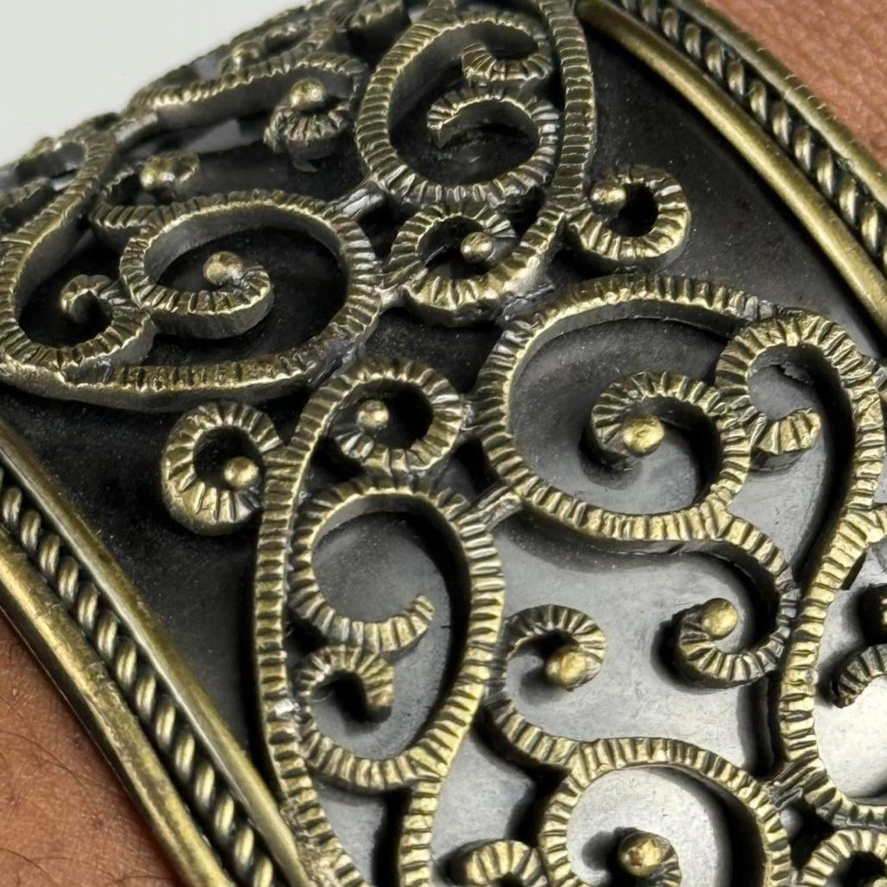 Gold tone bangle cuff