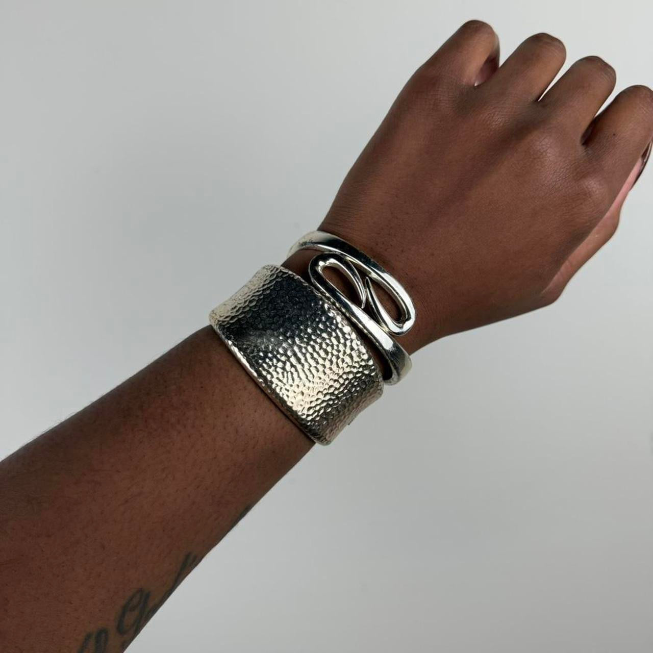 Silver tone cuff stack
