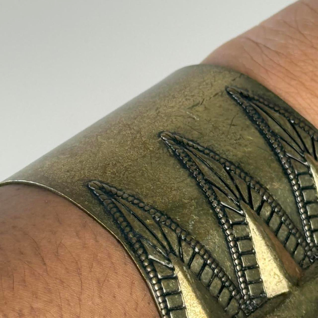 Gold tone bangle cuff