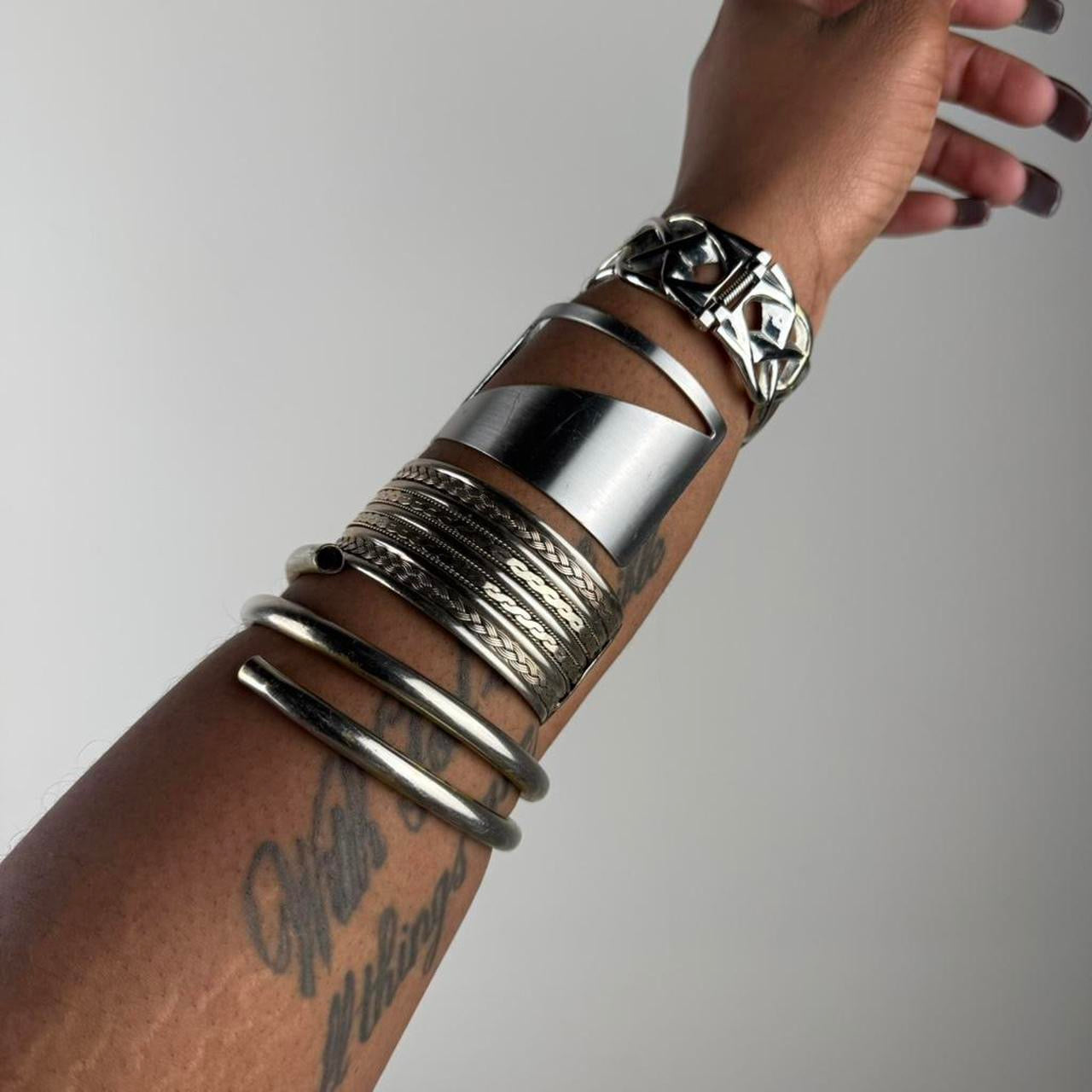 Silver tone cuff stack