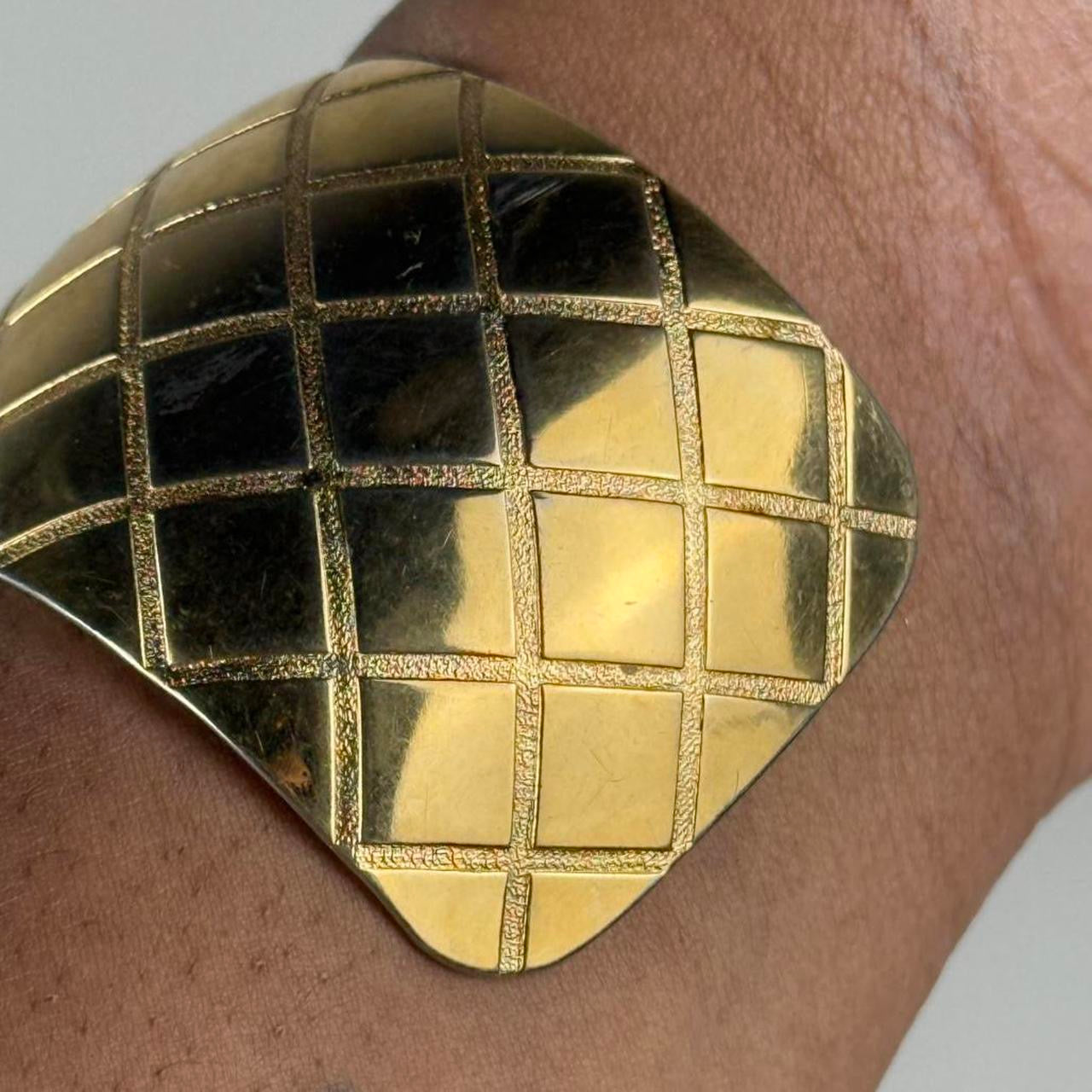 Gold tone bangle cuff