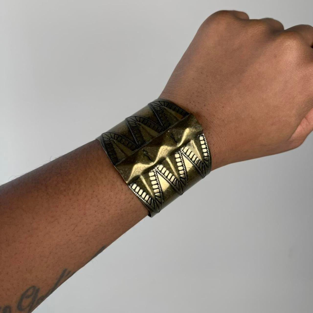Gold tone bangle cuff