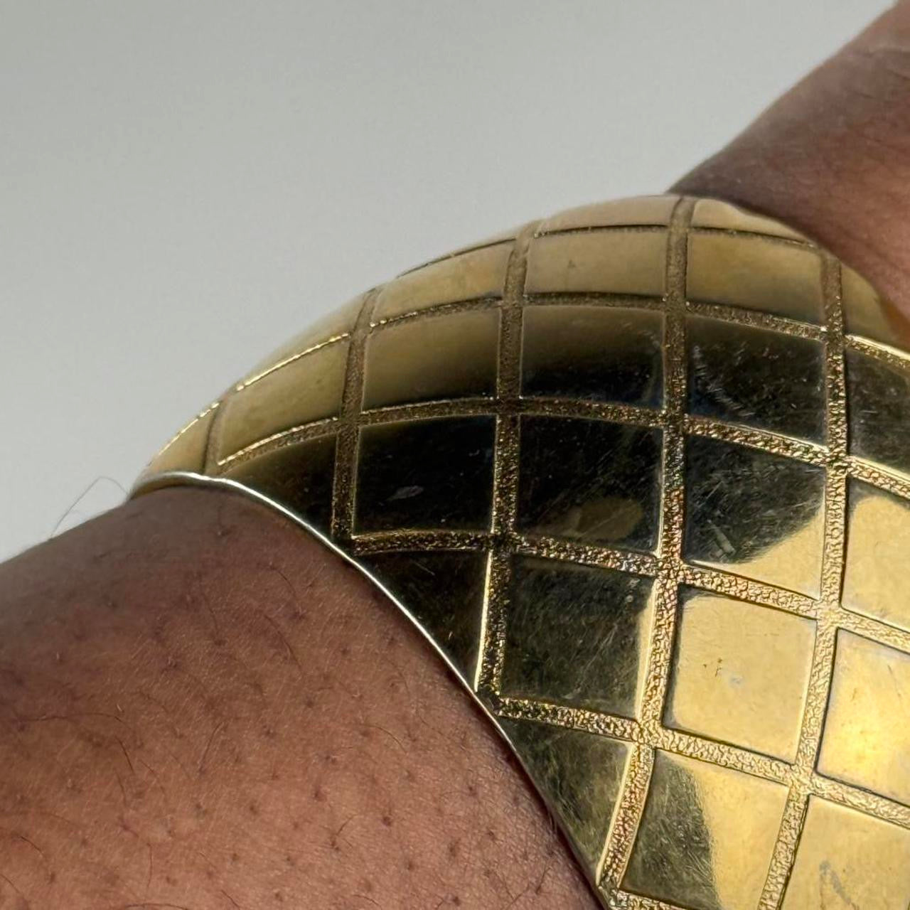 Gold tone bangle cuff