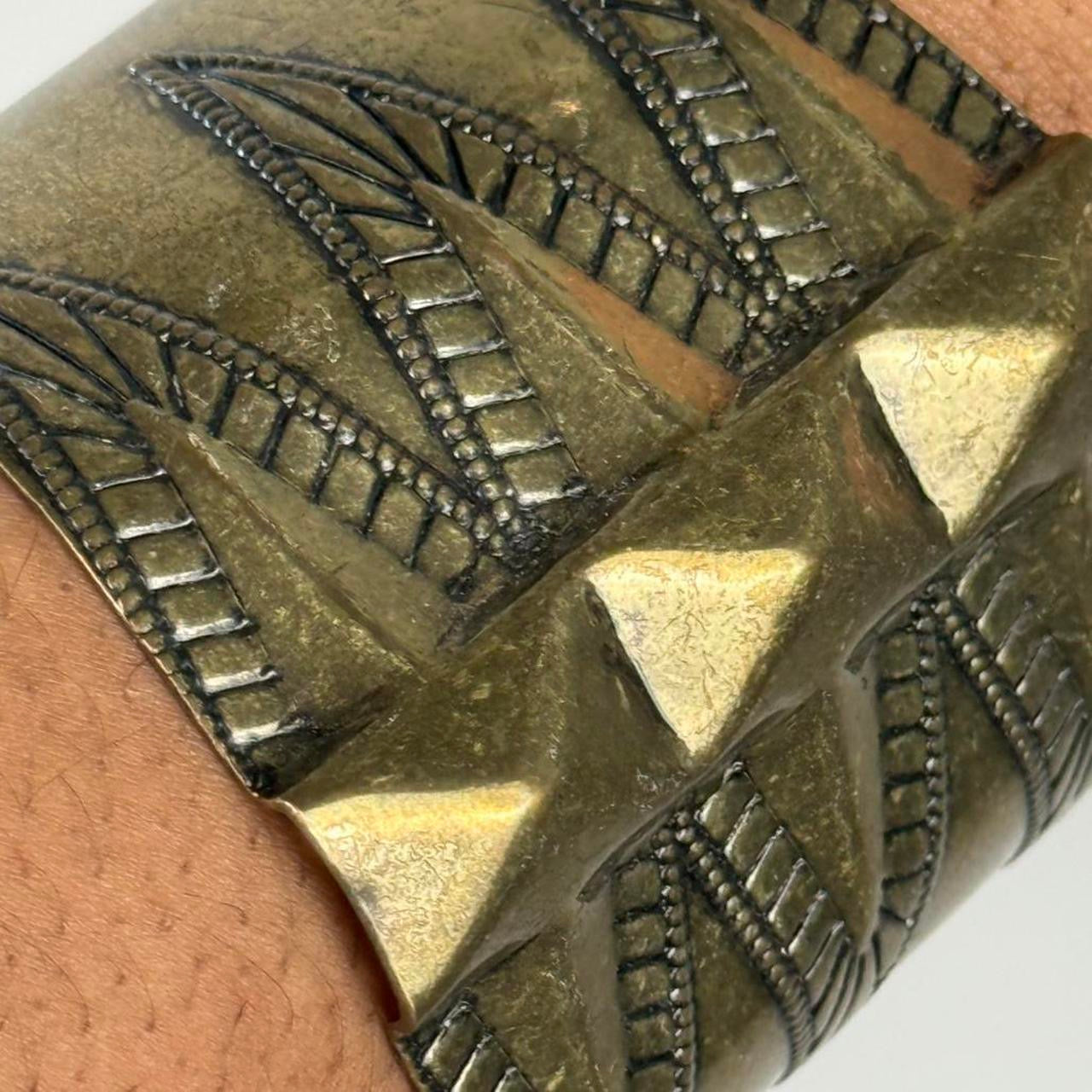 Gold tone bangle cuff