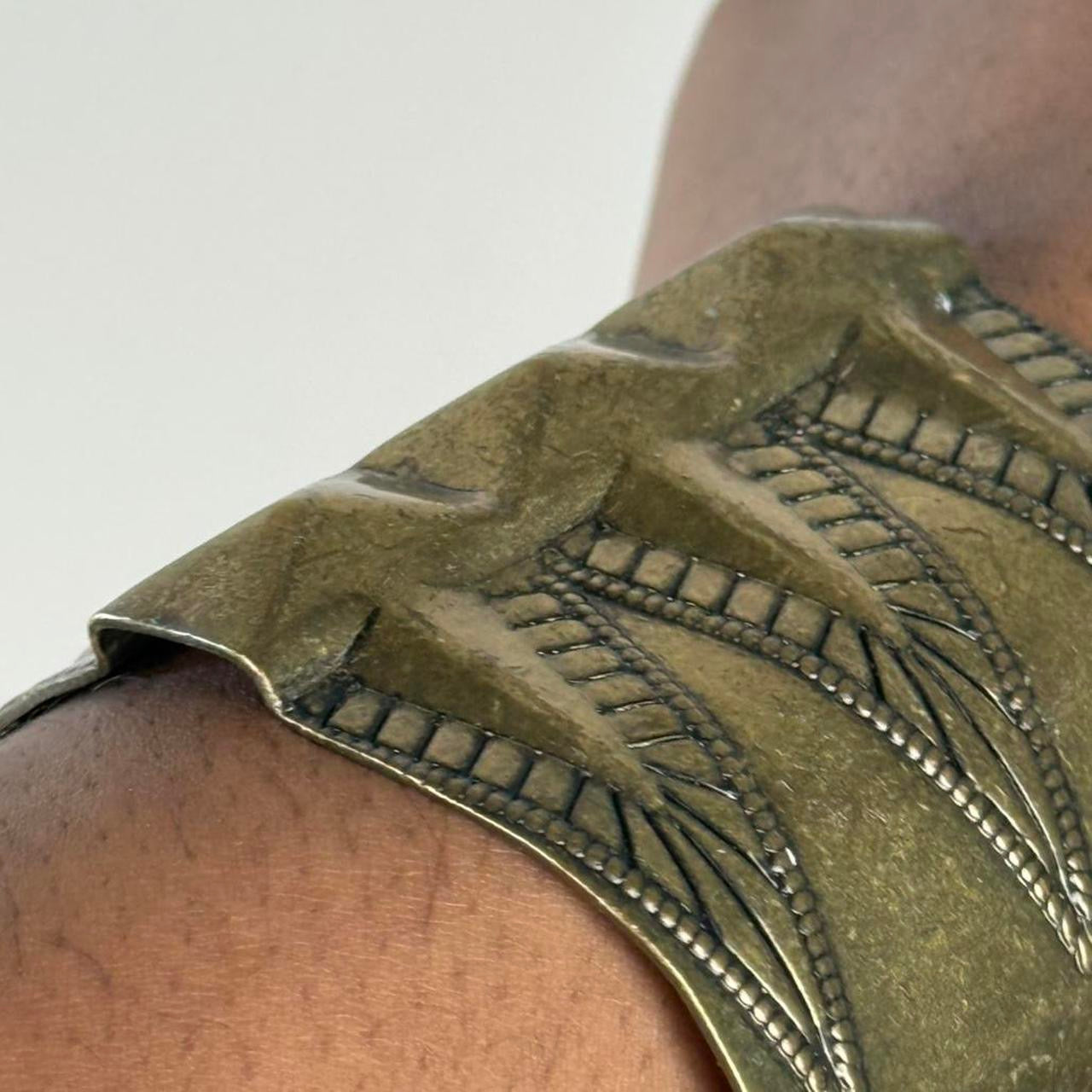 Gold tone bangle cuff