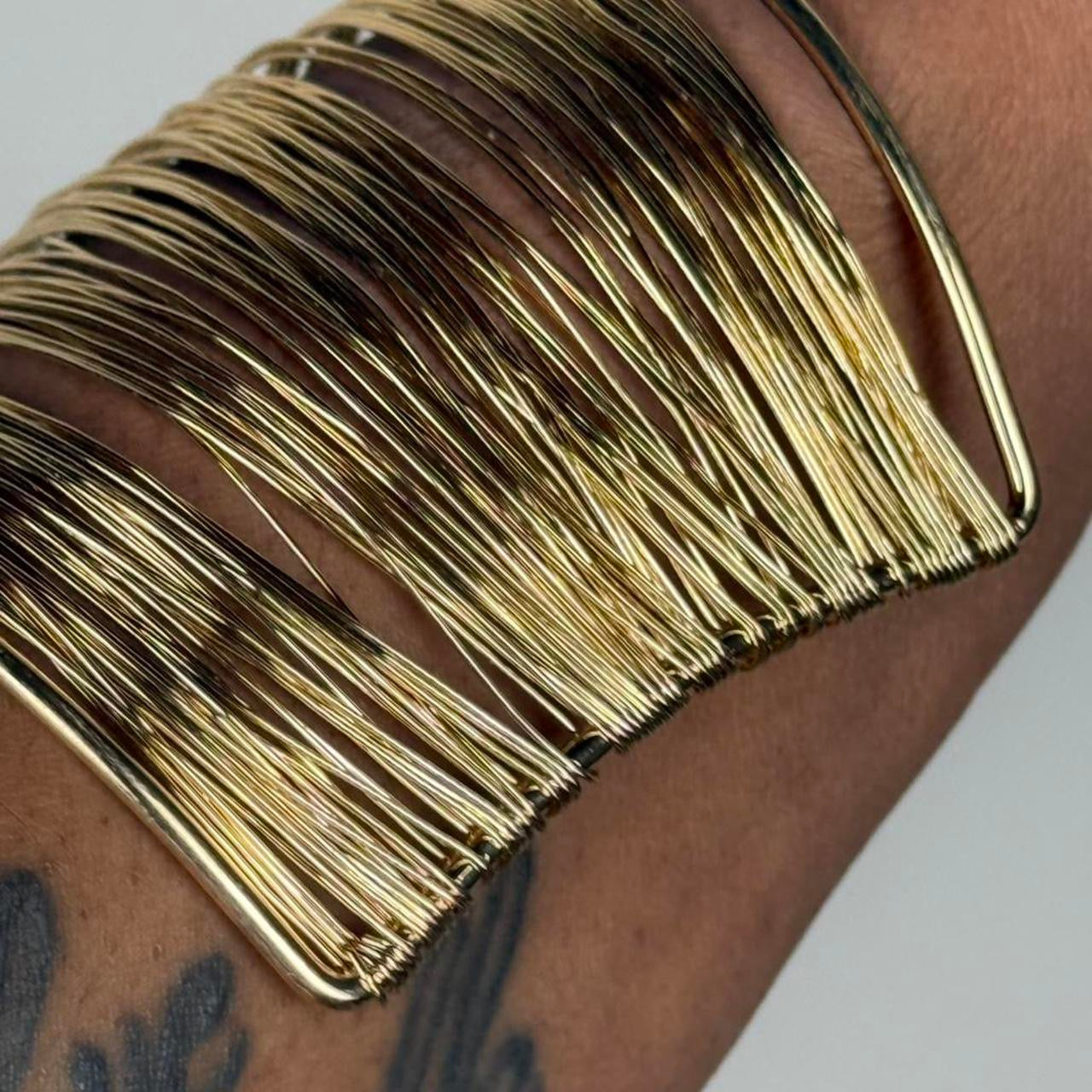 Gold tone bangle cuff