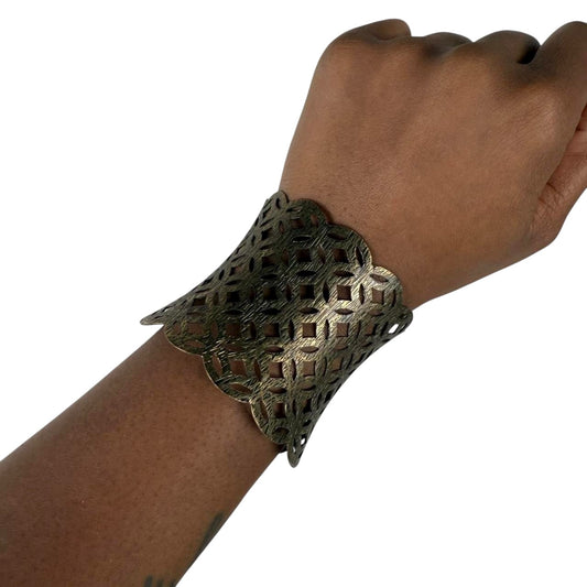 Gold tone bangle cuff