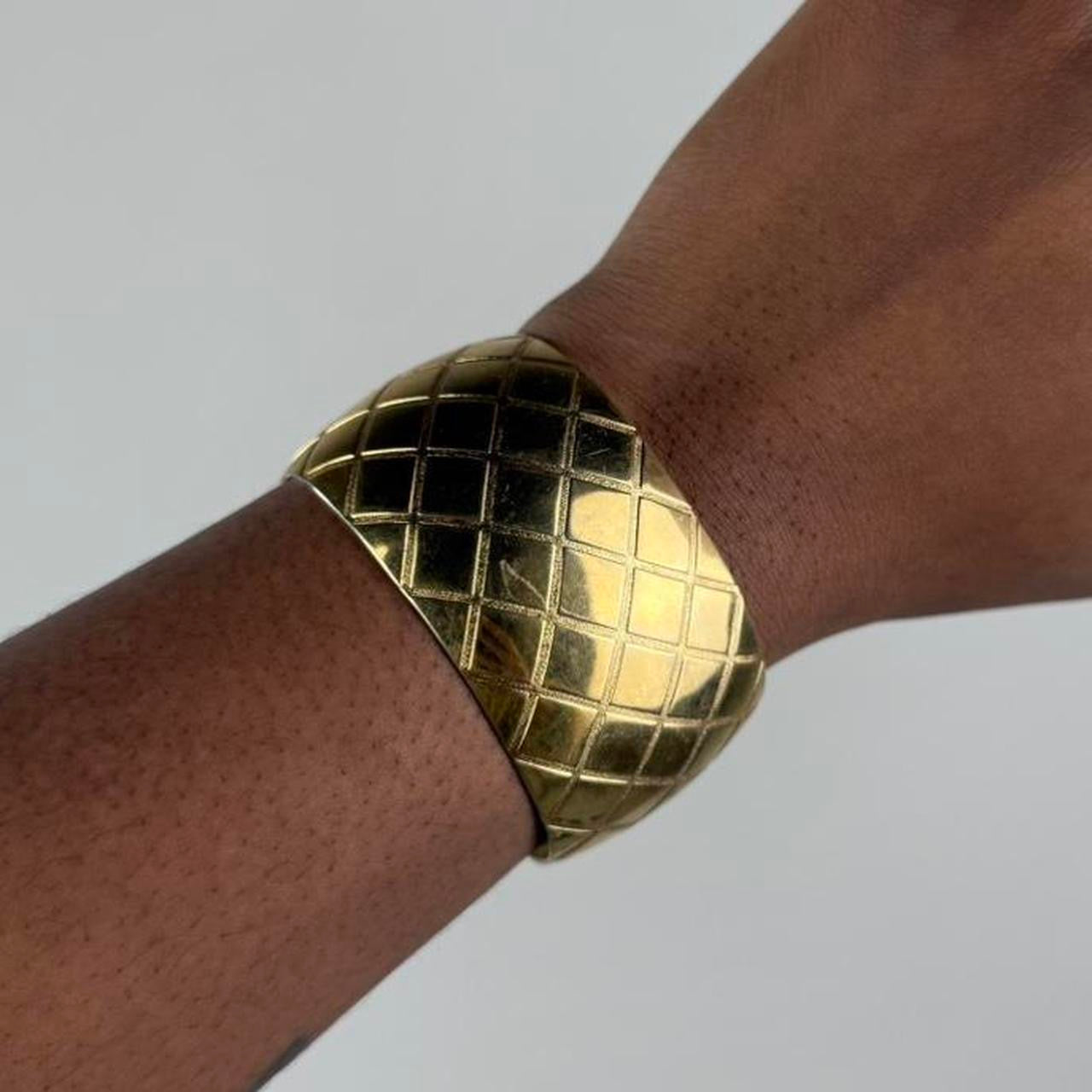 Gold tone bangle cuff