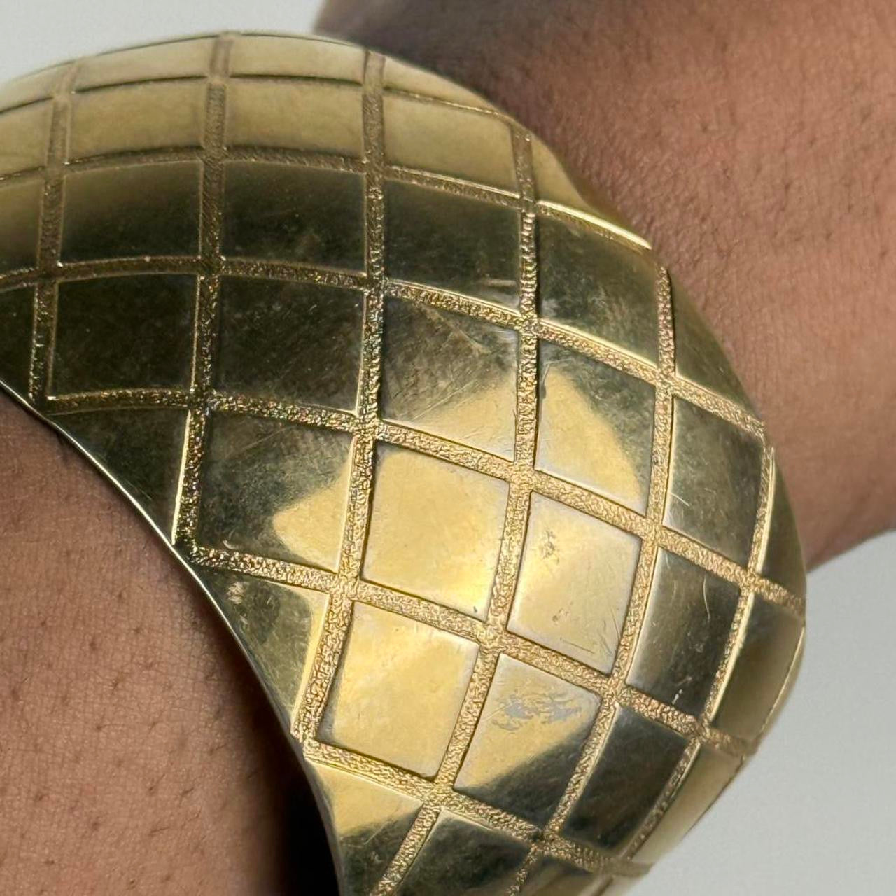 Gold tone bangle cuff