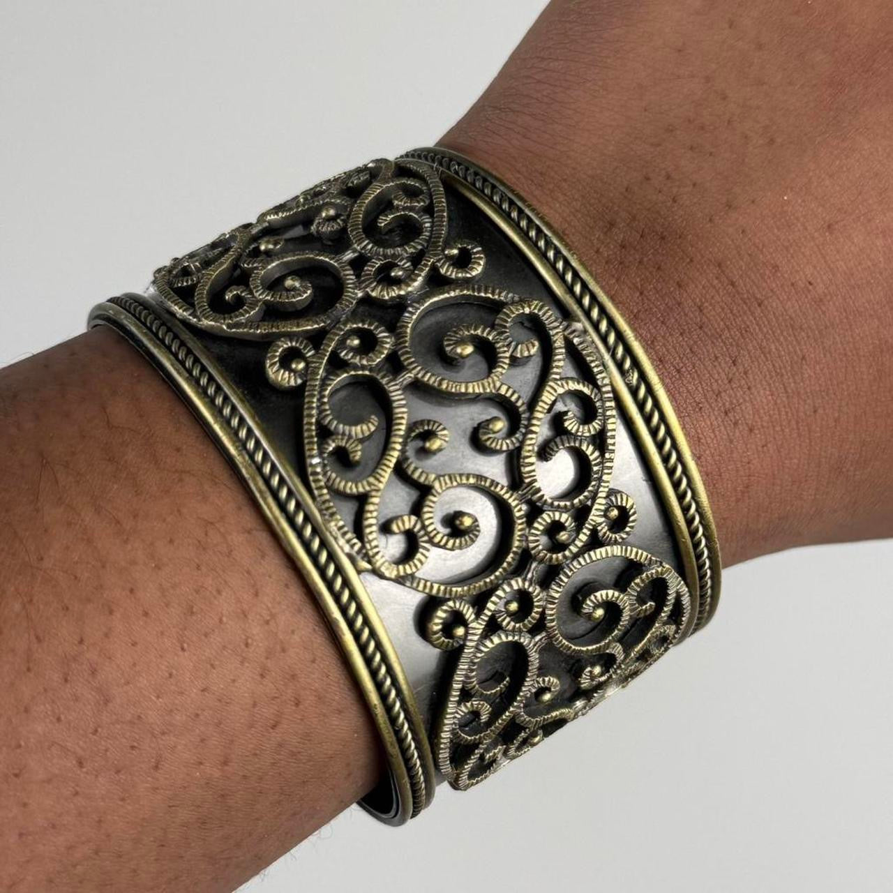 Gold tone bangle cuff